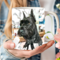  3D tear-effect dog design on a mug. Name-printed schnauzer art mug. The photo shows a close-up of a woman holding a personalized coffee mug